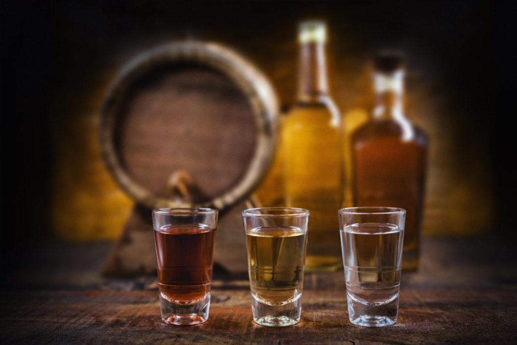 glasses alcoholic beverages cachaca rum cognac selection strong alcoholi...